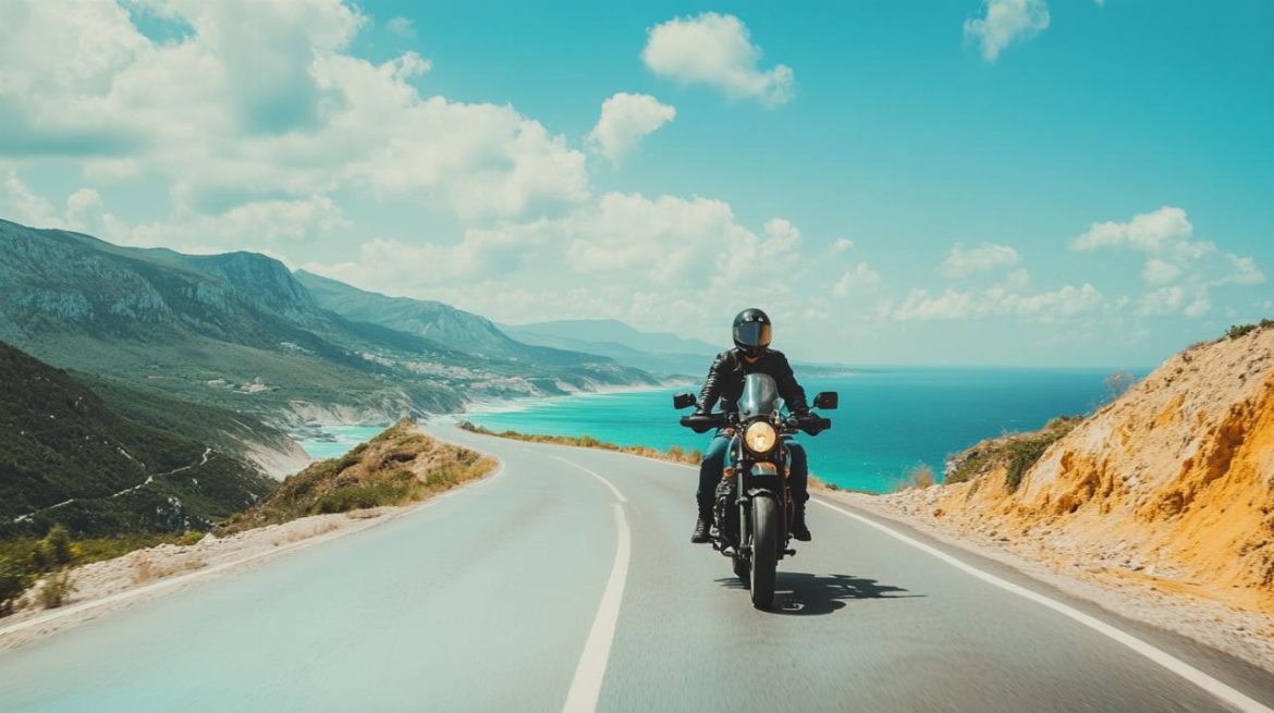 Winding coastal road motorbike travel overlooking the turquoise ocean, the ultimate motorbike travel experience
